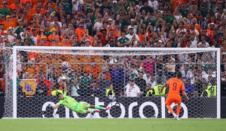 Netherlands' Wout Weghorst scores.