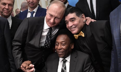 Russian President Vladimir Putin (L), Brazilian soccer legend Pele (C), and Argentinian soccer legend Diego Maradona (R) pose before the Final Draw of the FIFA World Cup 2018 at the State Kremlin Palace in Moscow, Russia, 01 December 2017.