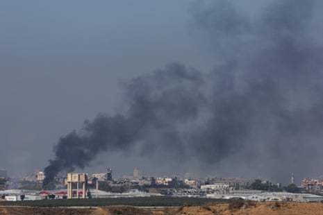 Smoke rises above Gaza as seen from southern Israel.