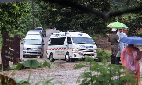 An ambulance leaves from the Tham Luang cave area as the operations continue for those still trapped inside the cave in Khun Nam Nang Non Forest Park