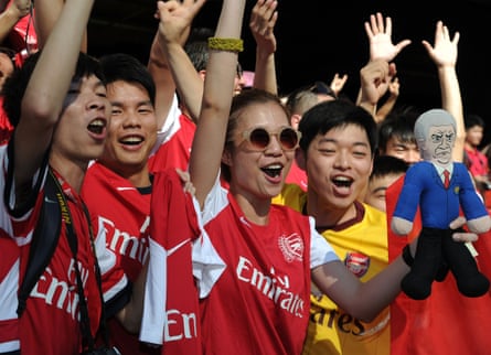 Arsenal fans support the team during a 2-2 draw against Kitchee FC in Hong Kong in 2012