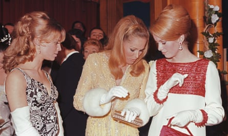 From left, Julie Christie, Ursula Andress and Catherine Deneuve attend a royal film performance at the Odeon, Leicester Square, in 1966.