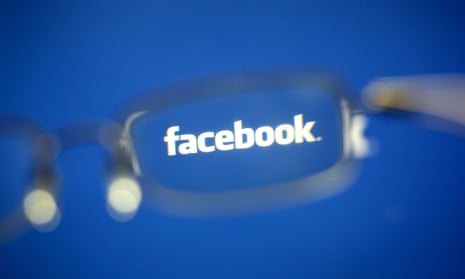 Facebook logo seen through glasses