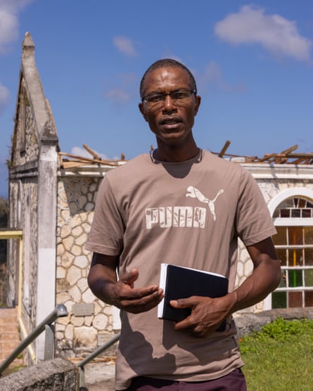 Bowen gestured as he speaks in front of the roofless church