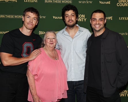 Men and woman on red carpet