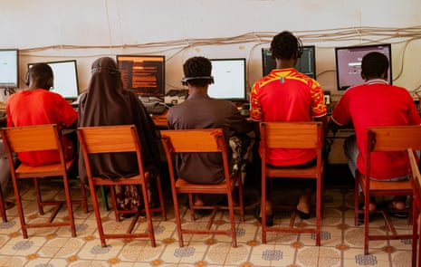 People work on computers