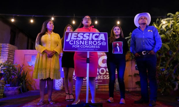 Progressive Democrat Jessica Cisneros addresses her watch party next to her family during her primary election runoff with Henry Cuellar in Laredo, Texas, in May.