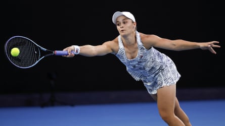 Ash Barty of Australia plays a forehand return to Danielle Collins of the U.S during the women's singles final at the Australian Open tennis championships in Saturday, Jan. 29, 2022,
