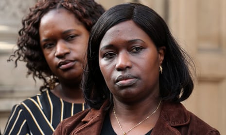 Kadijatu Johnson (right) and Adama Jalloh, sisters of Sheku Bayoh, speak to the media outside the Crown Office in Edinburgh.