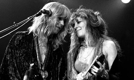 Fleetwood Mac singer-songwriter Christine McVie (left) with Stevie Nicks, performing at The Omni Coliseum in Atlanta, Georgia in 1977.