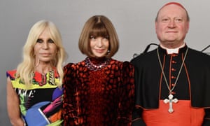 Donatella Versace and Anna Wintour with Cardinal Ravasi.