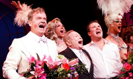 Jerry Herman, centre in black suit, with the cast of La Cage aux Folles in the Menier production at the Longacre theatre, Broadway, in 2010.