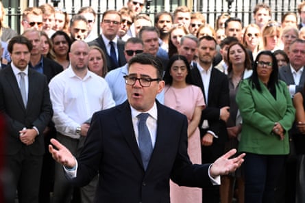 Andy Burnham speaks to staff and the media outside No 10