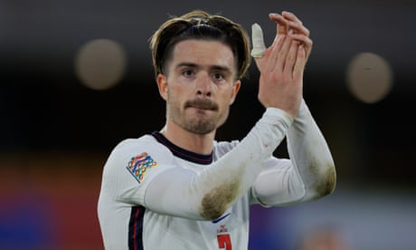 Jack Grealish applauds the limited number of fans in attendance at Molineux after England's draw with Italy