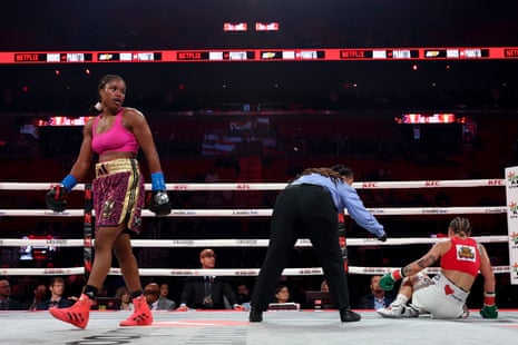 Caroline Dubois knocks down Camila Panatta during the sixth round of their lightweight title fight.