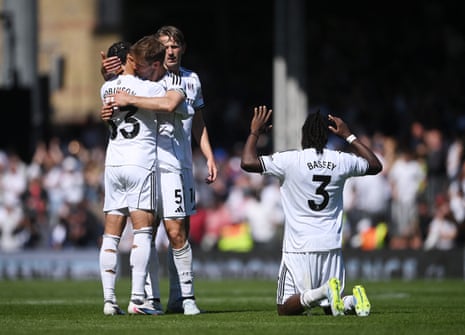 Fulham's Calvin Bassey (right), Antonee Robinson (left), Joachim Andersen (second left) and Sander Berge celebrate after the final whistle.