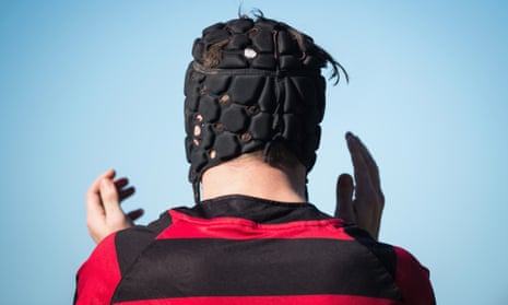 teenager in rugby headgear