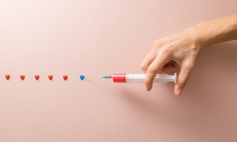 A needle injecting a series of small love hearts