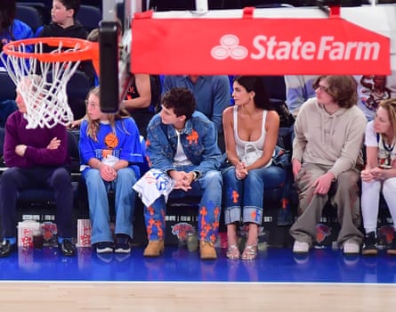 Timothée Chalamet and Kylie Jenner some wearing bluish denim pinch orangish patches
