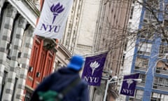 banners for New York University hang from a building