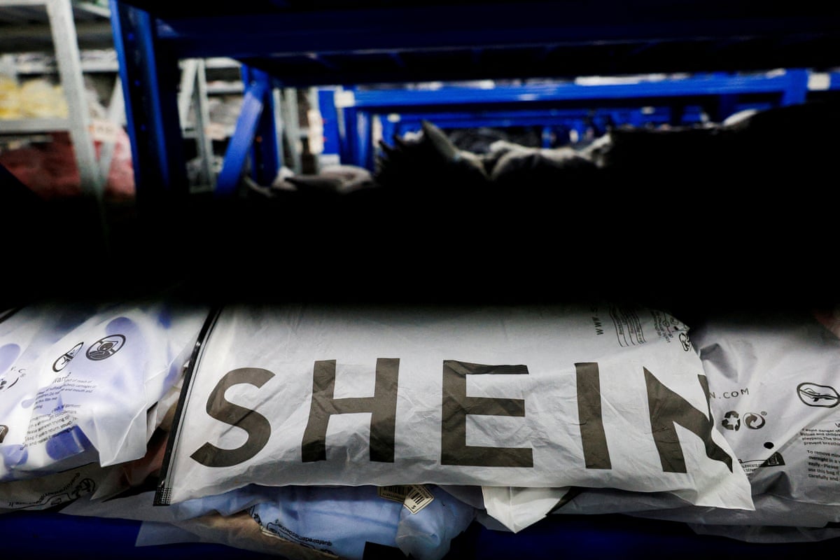 Packs of clothing are displayed at a garment factory for Shein in Panyu District, Guangzhou, Guangdong province, China, on 27 July.