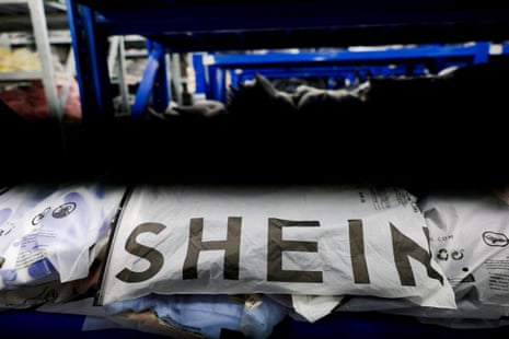 Packs of clothing are displayed at a garment factory for Shein in Panyu District, Guangzhou, Guangdong province, China, on 27 July.