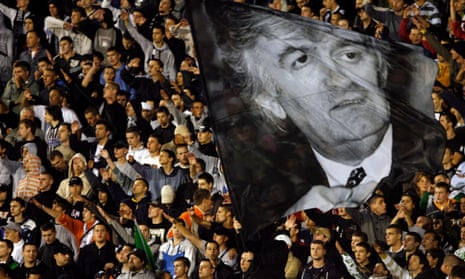 Nationalist football fans wave a picture of Radovan Karadzic at match a in Belgrade, July 2008.