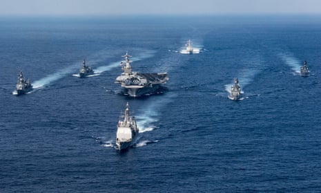 The Nimitz-class aircraft carrier USS Carl Vinson and other US ships, seen in the Philippine Sea in March. 