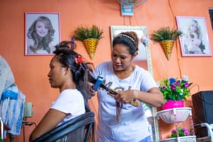 Manuela Dos Santos in her hairdressing shop in Dili