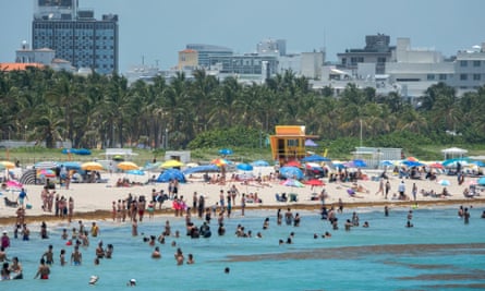 Beachgoers enjoy the warm weather in Florida on Wednesday.