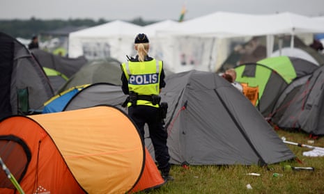 A police offer at Bravalla festiva in Sweden, where five women reported having been raped.