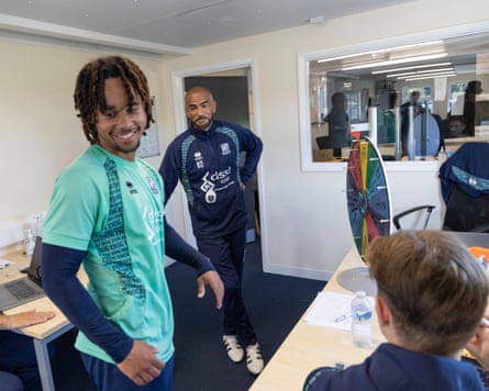 The Southend forward Zavier Massiah-Edwards laughs with his manager, Kieron Dyer, after losing a minor forfeit on the club’s wheel of misfortune.