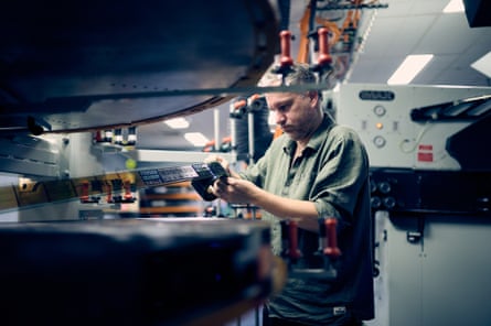 Dan Drobik working with the reel of film of the Odyssey