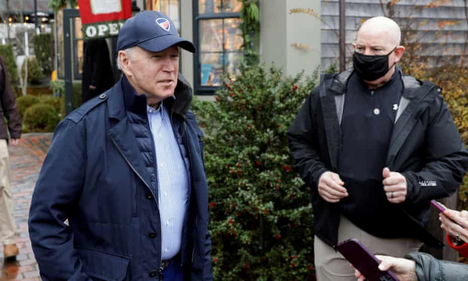 Joe Biden speaks to the media before entering a bookstore in Nantucket on Saturday.