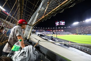 A fan looks on during Saturday’s game at Bristol Motor Speedway.