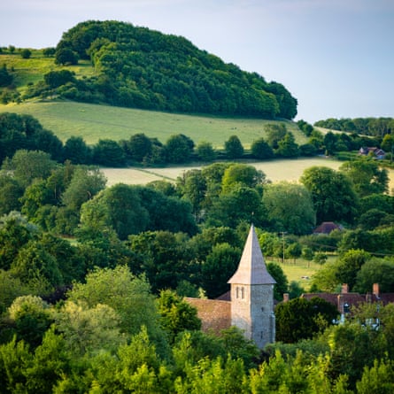 The village and Church of Postling, Kent. A notable view from the North Downs Way and Folkestone Downs.