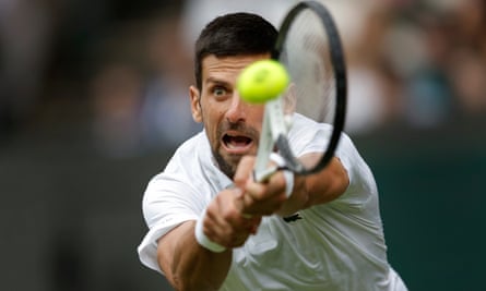Novak Djokovic returns serve in his victory over Andrey Rublev on Centre Court