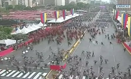 Hundreds of Venezuelan soldiers break formation after an evacuation warning following the detonation of ‘drone-type flying devices’.