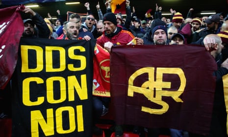 Roma fans hold banners in honour of Daniele De Santis, who murdered a rival fan in 2014.