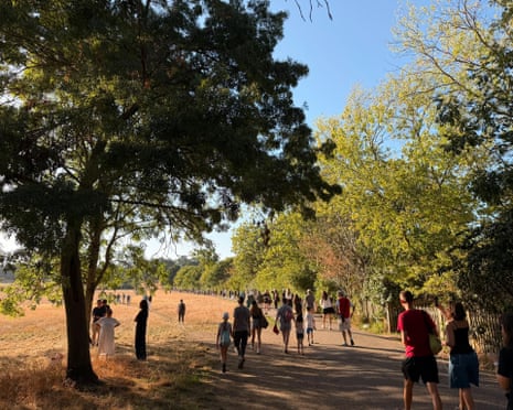 Crowds going to the higher parts of Hampstead Heath to watch the partial sun eclipse in London