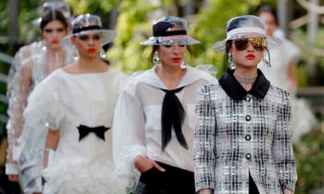 See-through plastic hats were in abundance at Chanel’s spring-summer collection in Paris.