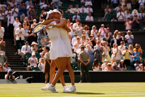 Russia's Veronika Kudermetova and Belgium's Elise Mertens celebrate winning their women's doubles final against Latvia's Jelena Ostapenko and Taiwan's Hsieh Su-wei.