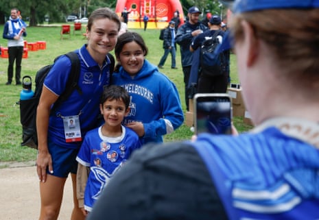 Ash Riddell joins Kangaroos fans for a photos ahead of the 2025 AFLW grand final