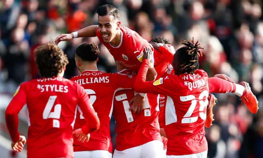 Amine Bassi is lifted by teammates after scoring for Barnsley in last weekend’s 3-2 win over Middlesbrough