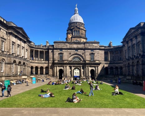 Students enjoying the sunshine at The Old College courtyard and quadrangle, University of Edinburgh, Edinburgh Scotland
