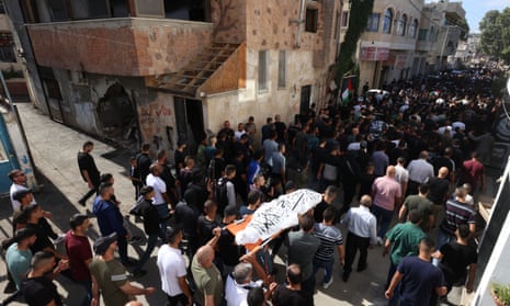 A funeral procession at the Jenin refugee camp on Friday.