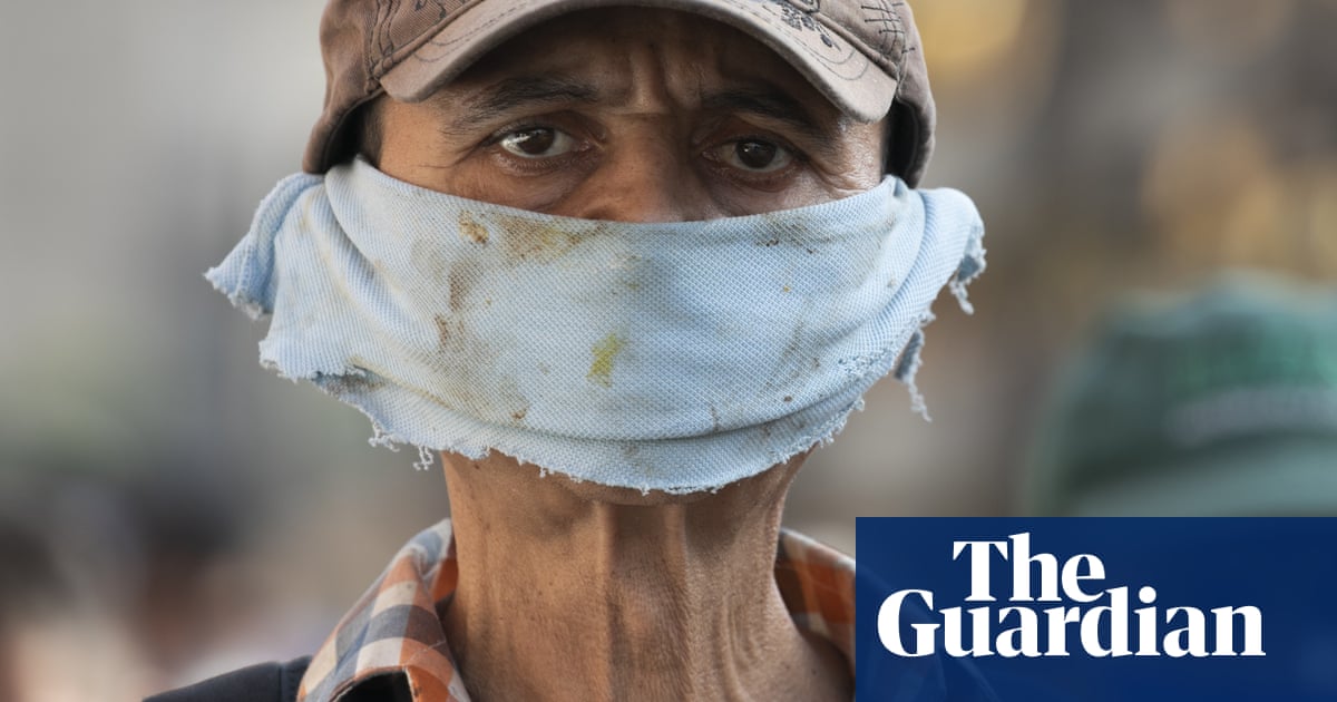Coronavirus face masks around the world – in pictures | World news