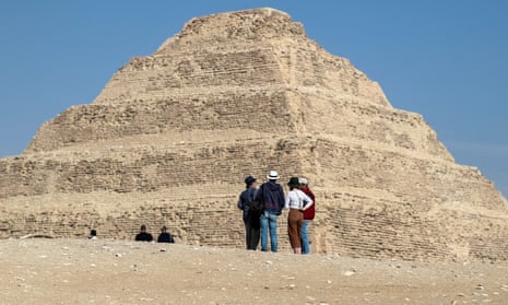 Visitors view the step pyramid of Djoser in Egypt’s Saqqara necropolis, south of Cairo.