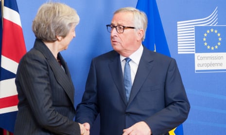 Theresa May with Jean-Claude Juncker in Brussels.