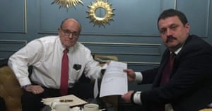 Ukrainian lawmaker Andriy Derkach meets with Donald Trump’s personal lawyer, Rudy Giuliani in Kiev.